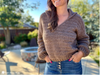 woman wearing blanche crochet v neck sweater