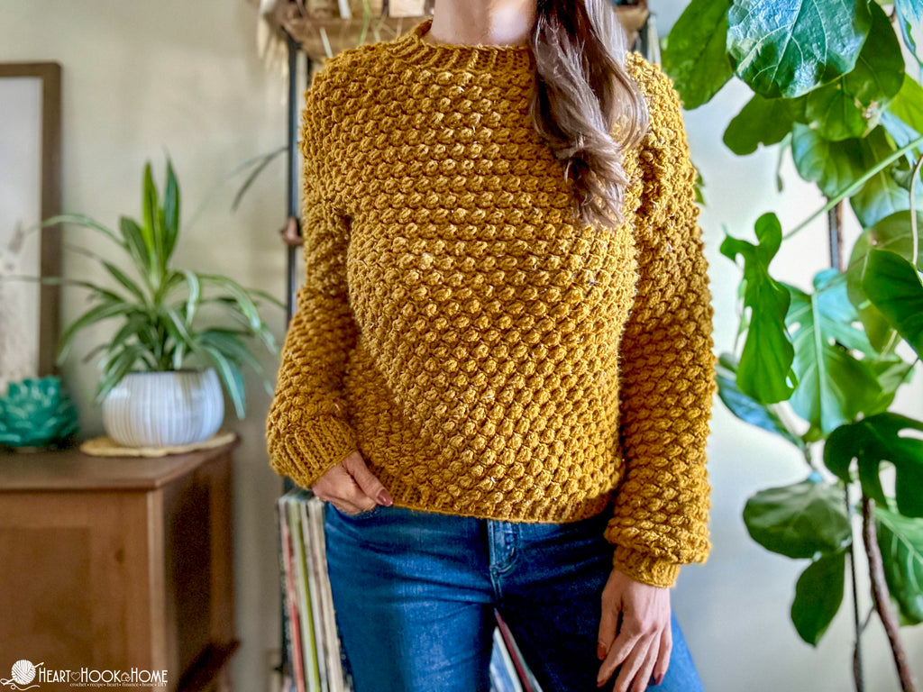 woman wearing wild berry crochet pullover sweater
