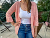 woman wearing textured crochet office cardigan