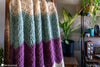 close up cluster stitch ripple crochet blanket texture