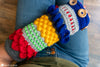 hands inside crochet twiddle muff sensory hand warmer