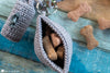 crochet dog treat bag clipped to waistband for training