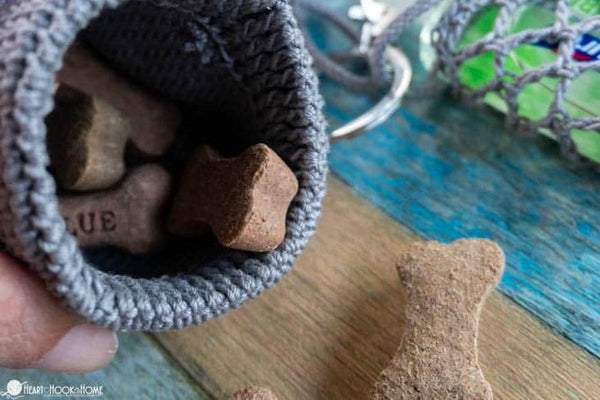 close up crochet dog treat bag texture and closure detail