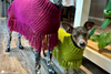 side view of crochet dog poncho showing fit and coverage