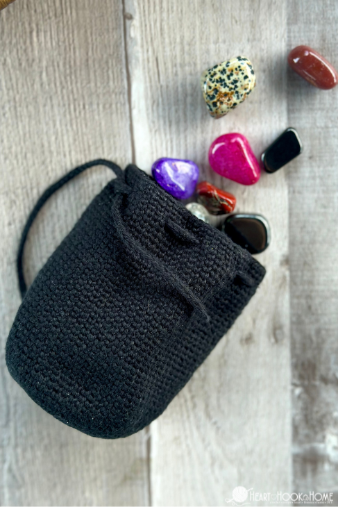 crochet drawstring pouch holding small items