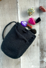 crochet drawstring pouch holding small items