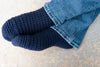 unisex crochet socks worn indoors cozy look