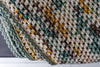 crochet granny blanket styled in home decor cozy throw