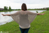woman wearing lightweight crochet poncho wrap
