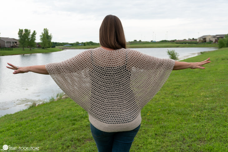 woman wearing lightweight crochet poncho wrap