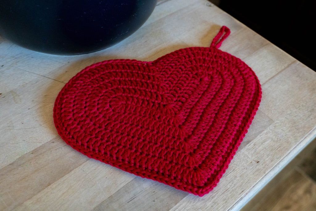 close up of crochet heart potholder stitch texture