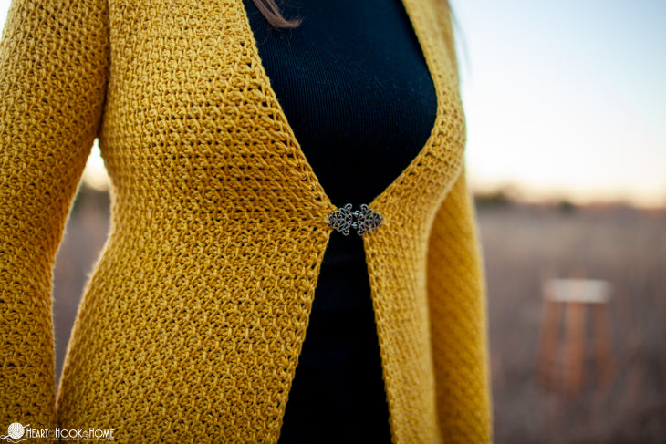woman wearing honeycomb crochet cardigan