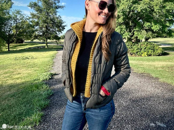 woman wearing layering hooded vest crochet pattern front view