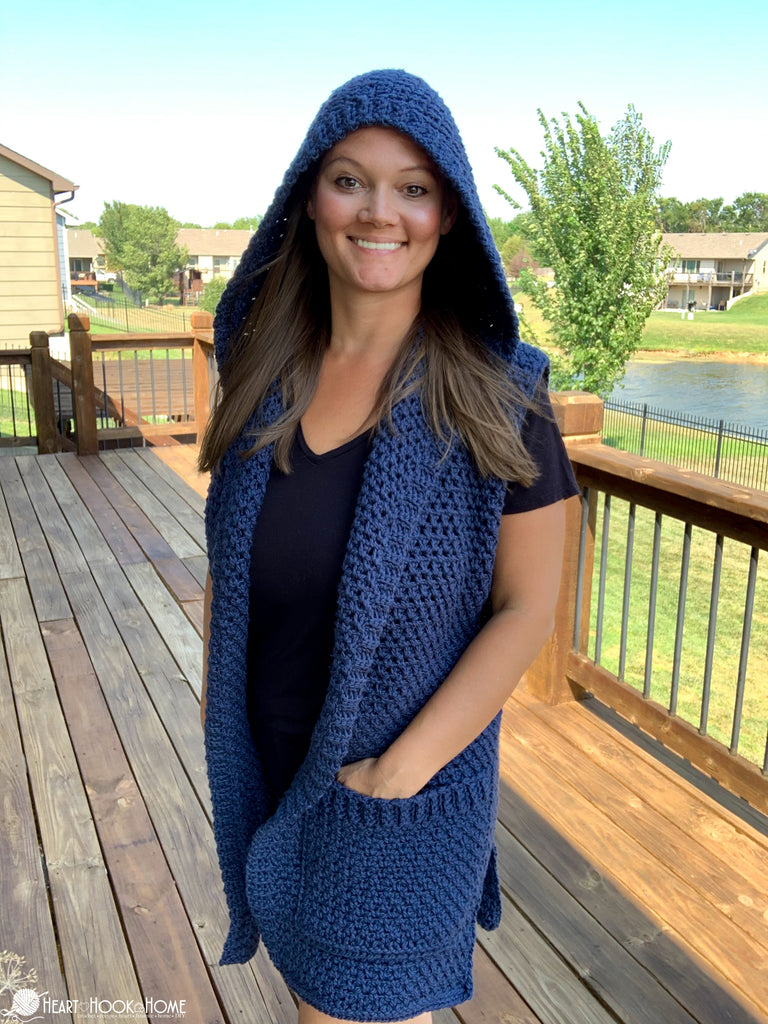 woman wearing moss stitch crochet hooded tunic