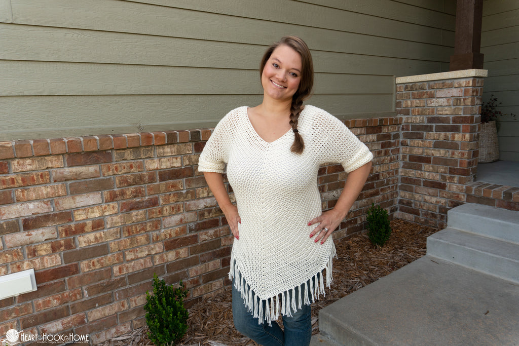 woman wearing textured crochet poncho wrap