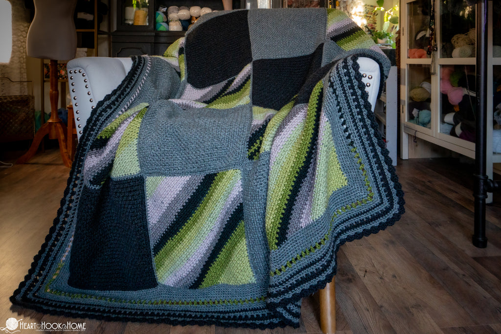 folded crochet blanket showing thickness and texture
