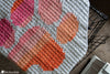 close up of c2c crochet paw print blanket texture