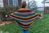 newborn wrapped in crochet cocoon blanket shell pattern