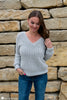 woman wearing basic v neck crochet sweater