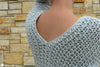 V-neck crochet sweater neckline detail