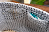 person wearing crochet yarn organizer fanny pack